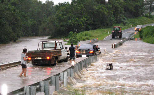 Two men on their way to work yesterday morning were caught in floodwater as they attempted to cross Yabba Creek near Imbil. Two men on their way to work yesterday morning were caught in floodwater as they attempted to cross Yabba Creek near Imbil.